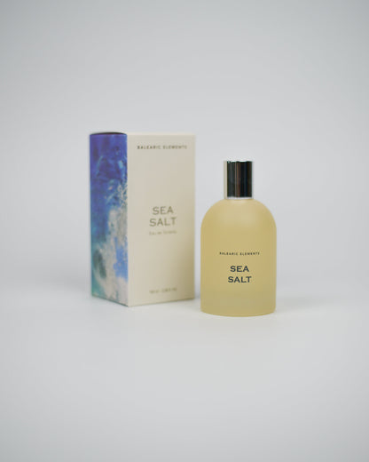 Bottle and box of Balearic Elements Sea Salt perfume on a white background