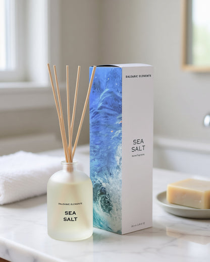 Sea Salt reed diffuser with packaging on a marble bathroom surface