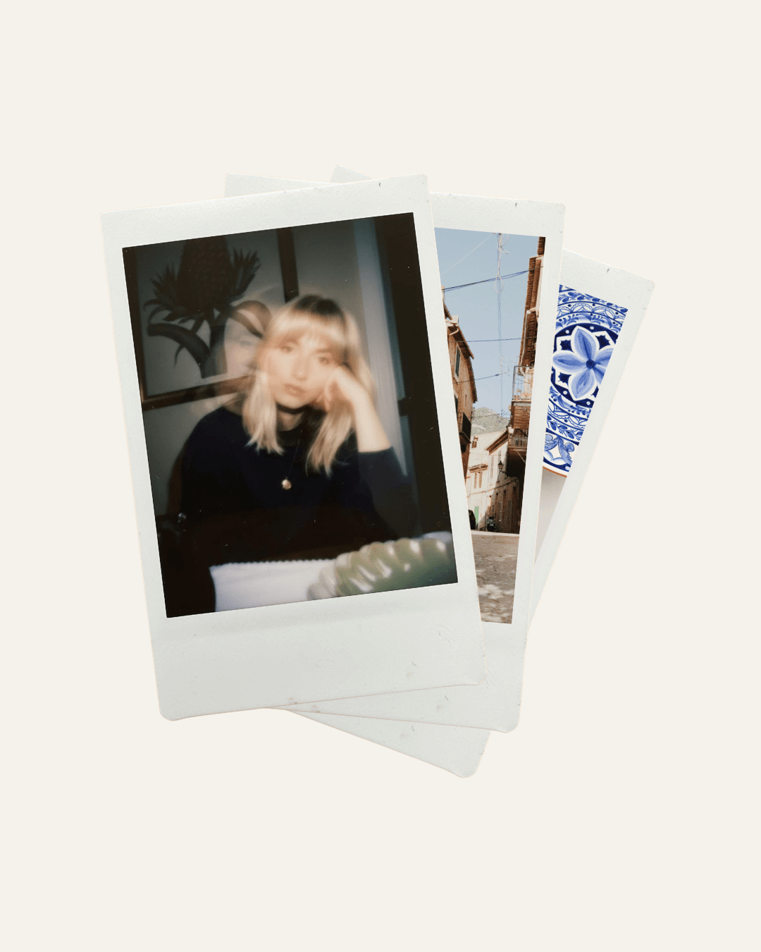 Stack of Polaroid photos on a white background