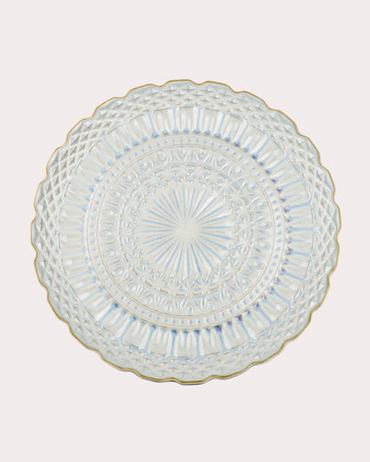 Decorative ceramic serving platter with intricate design on a white background