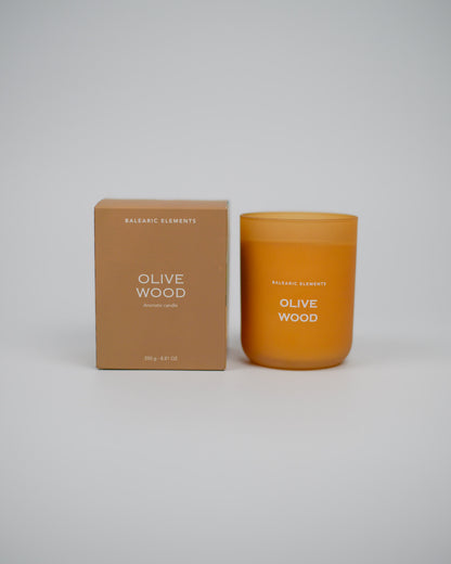 Scented candle labeled 'Olive Wood' with a matching box on a white background