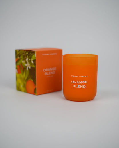 Orange scented candle labeled 'Orange Blend' with packaging on a white background