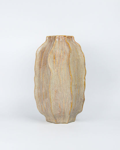Decorative vase with a textured surface on a white background